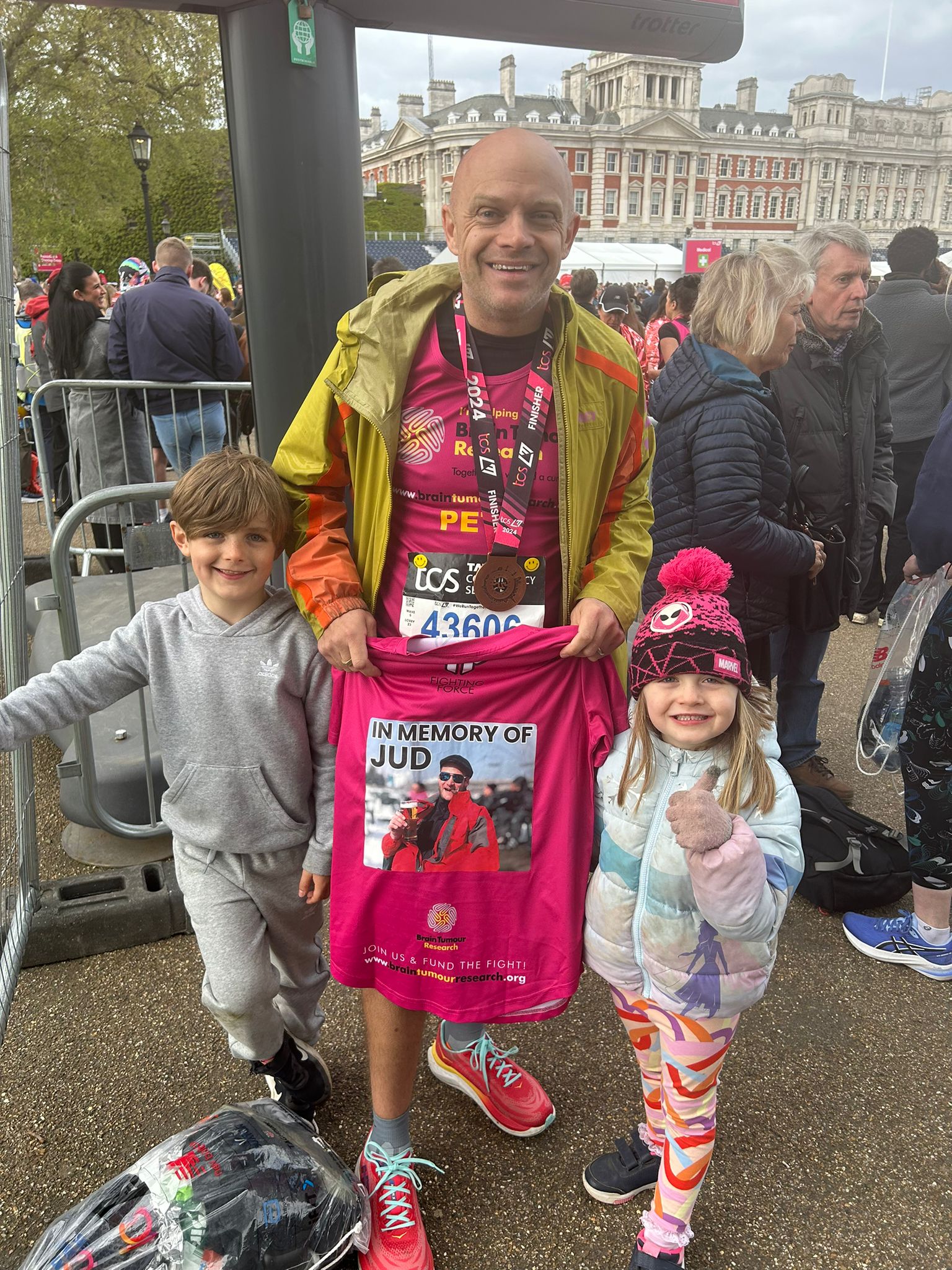 Pete Scholey at the London Marathon finish line with his children