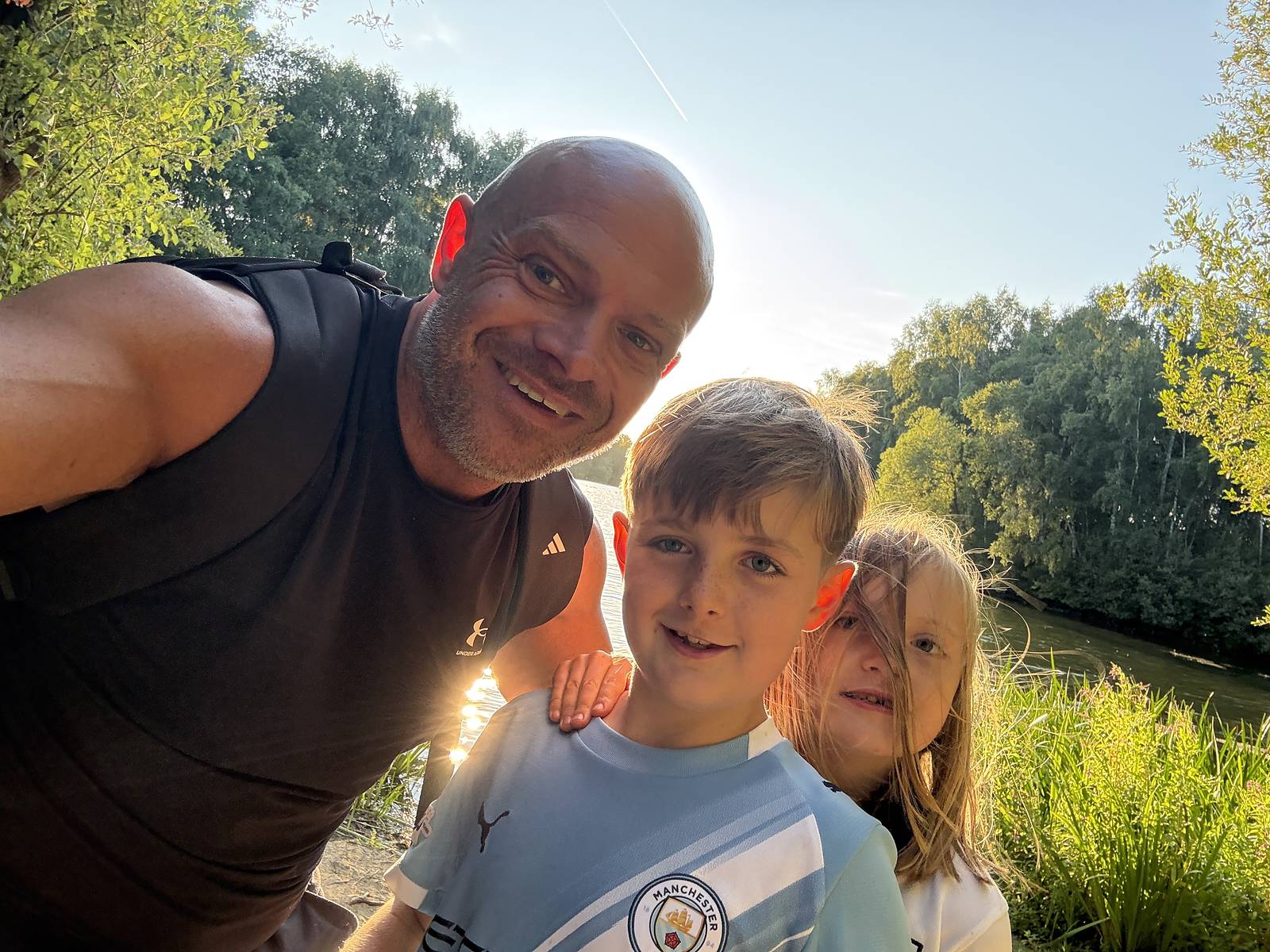 Pete with his two children by the river