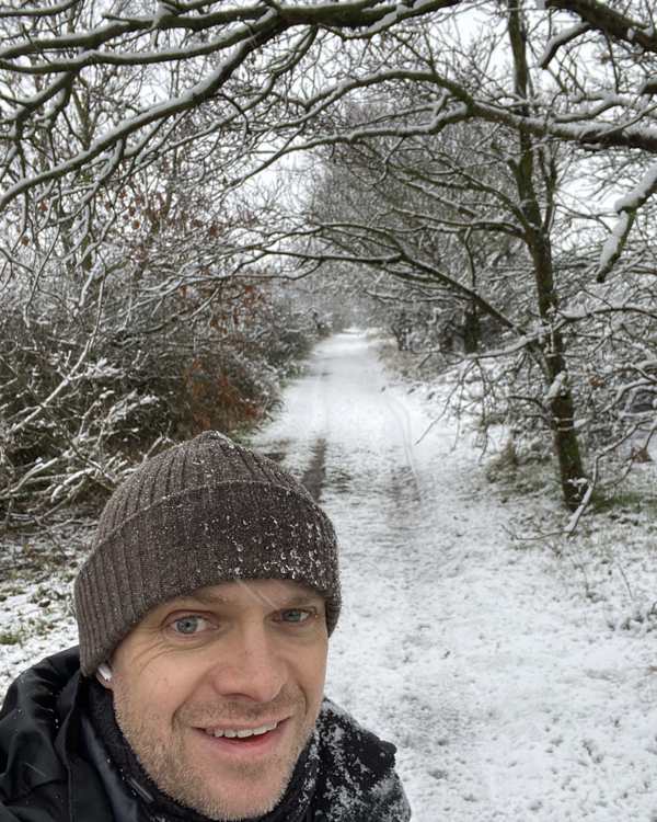 Pete walking in snow